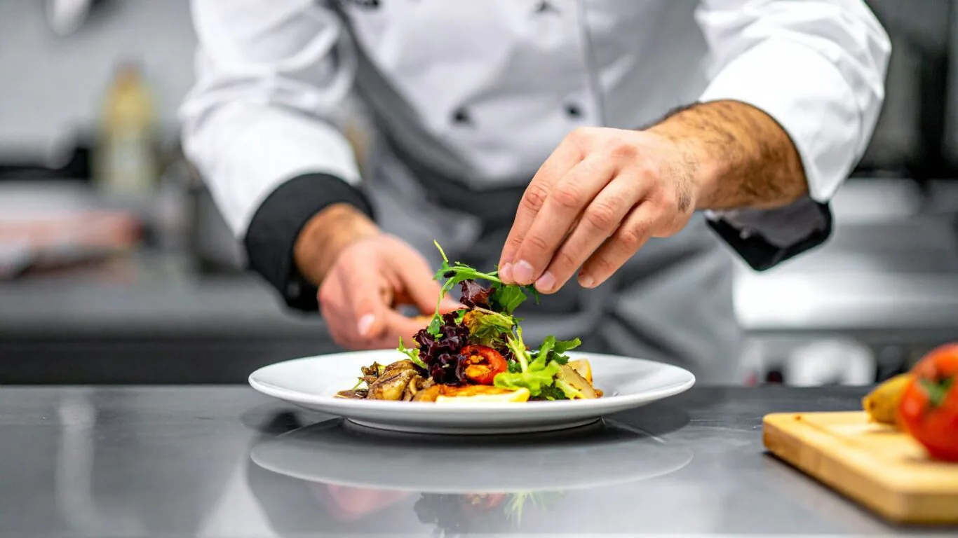chef plating dinner